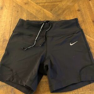 NIKE DRY FIT RUNNING SHORTS. Black. Draw string waist.
